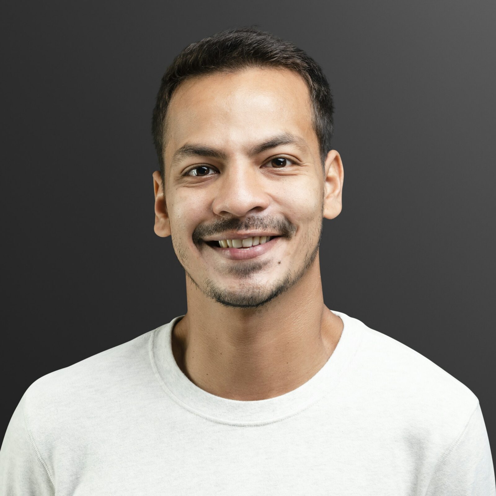 smiling-man-in-white-long-sleeve-tee-portrait.jpg